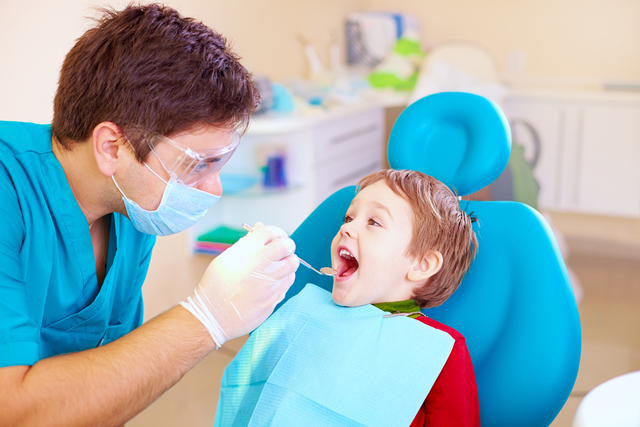 Small kid patient visiting specialist in dental clinic how family dentistry builds confidence in children through familiar care